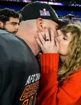 Taylor Swift kisses Kansas City Chiefs tight end Travis Kelce after an AFC Championship NFL football game against the Baltimore Ravens, Jan. 28, 2024, in Baltimore. The Kansas City Chiefs won 17-10. (AP Photo/Julio Cortez)