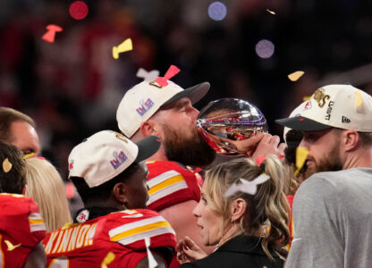 Kansas City Chiefs tight end Travis Kelce kisses the Vince Lombardi Trophy after the NFL Super Bowl 58 football game against the San Francisco 49ers, Feb. 11, 2024, in Las Vegas. The Chiefs won 25-22. (AP Photo/Abbie Parr)