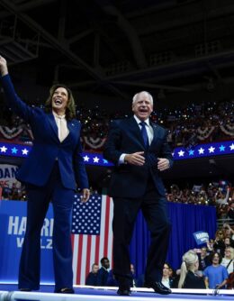 Democratic presidential nominee Vice President Kamala Harris and her running mate Minnesota Gov. Tim Walz arrive at a campaign rally in Philadelphia, Aug. 6, 2024. (AP Photo/Matt Rourke)