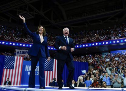 Democratic presidential nominee Vice President Kamala Harris and her running mate Minnesota Gov. Tim Walz arrive at a campaign rally in Philadelphia, Aug. 6, 2024. (AP Photo/Matt Rourke)