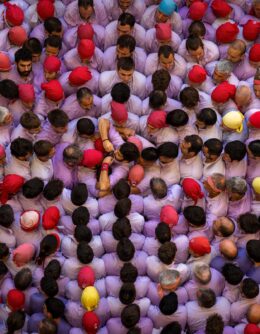 Members of “Colla Jove de Tarragona” form a “Castell” or human tower, during the 29th Human Tower Competition in Tarragona, Spain, Oct. 6, 2024. (AP Photo/Emilio Morenatti)
