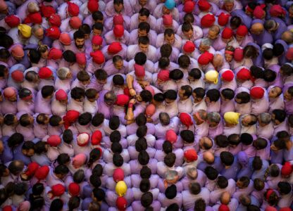 Members of “Colla Jove de Tarragona” form a “Castell” or human tower, during the 29th Human Tower Competition in Tarragona, Spain, Oct. 6, 2024. (AP Photo/Emilio Morenatti)