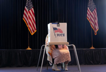 A voter works on her ballot at a polling place at the Ronald Reagan Presidential Library on Election Day, Nov. 5, 2024, in Simi Valley, Calif. (AP Photo/Chris Pizzello)