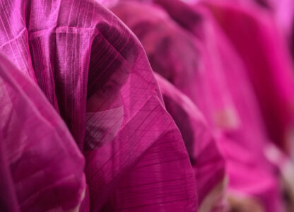 A Kashmiri Muslim bride sits along with others during a mass marriage of 51 couples in Srinagar, Indian controlled Kashmir, May 23, 2024. (AP Photo/Mukhtar Khan)
