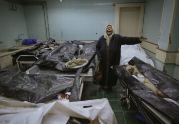 APTOPIX Syria Searching Morgues