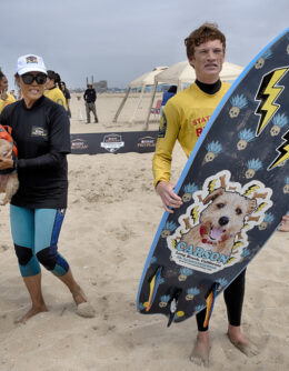 CORRECTION Huntington Beach Dog Surfing